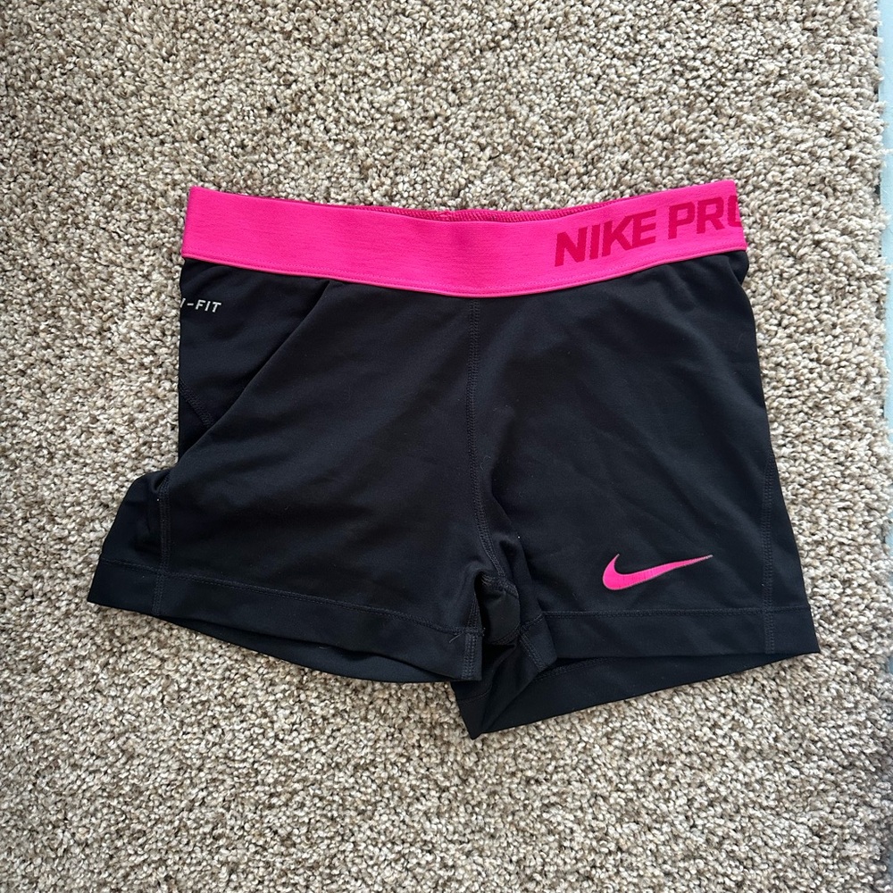 Black with pink waist band Nike spandex